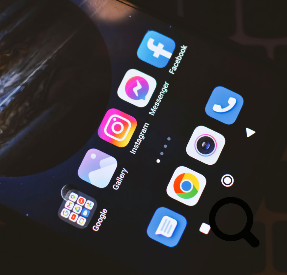 Smartphone screen showing popular social media and app icons including Facebook and Instagram.